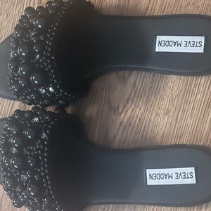 Steve Madden slides.